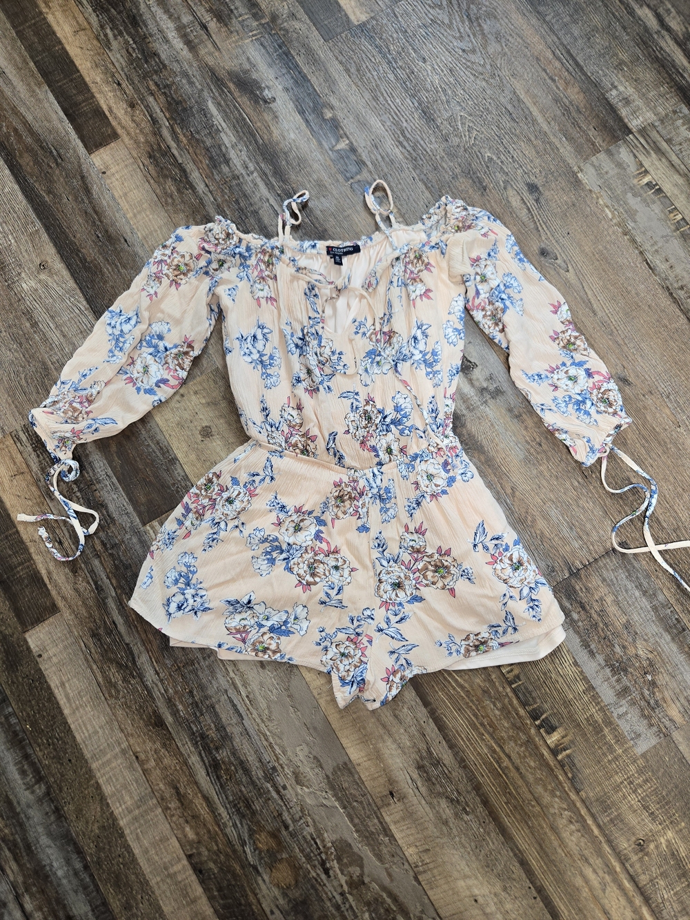 one clothing Peach Floral Off-Shoulder Romper with Blue & Pink Blooms